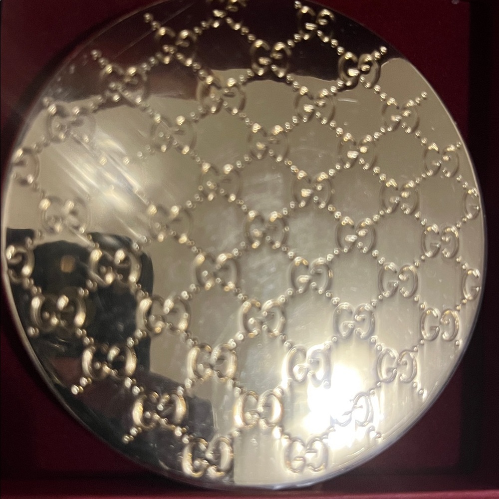 Gucci Gold Round Compact, with GG logo on the top & back.